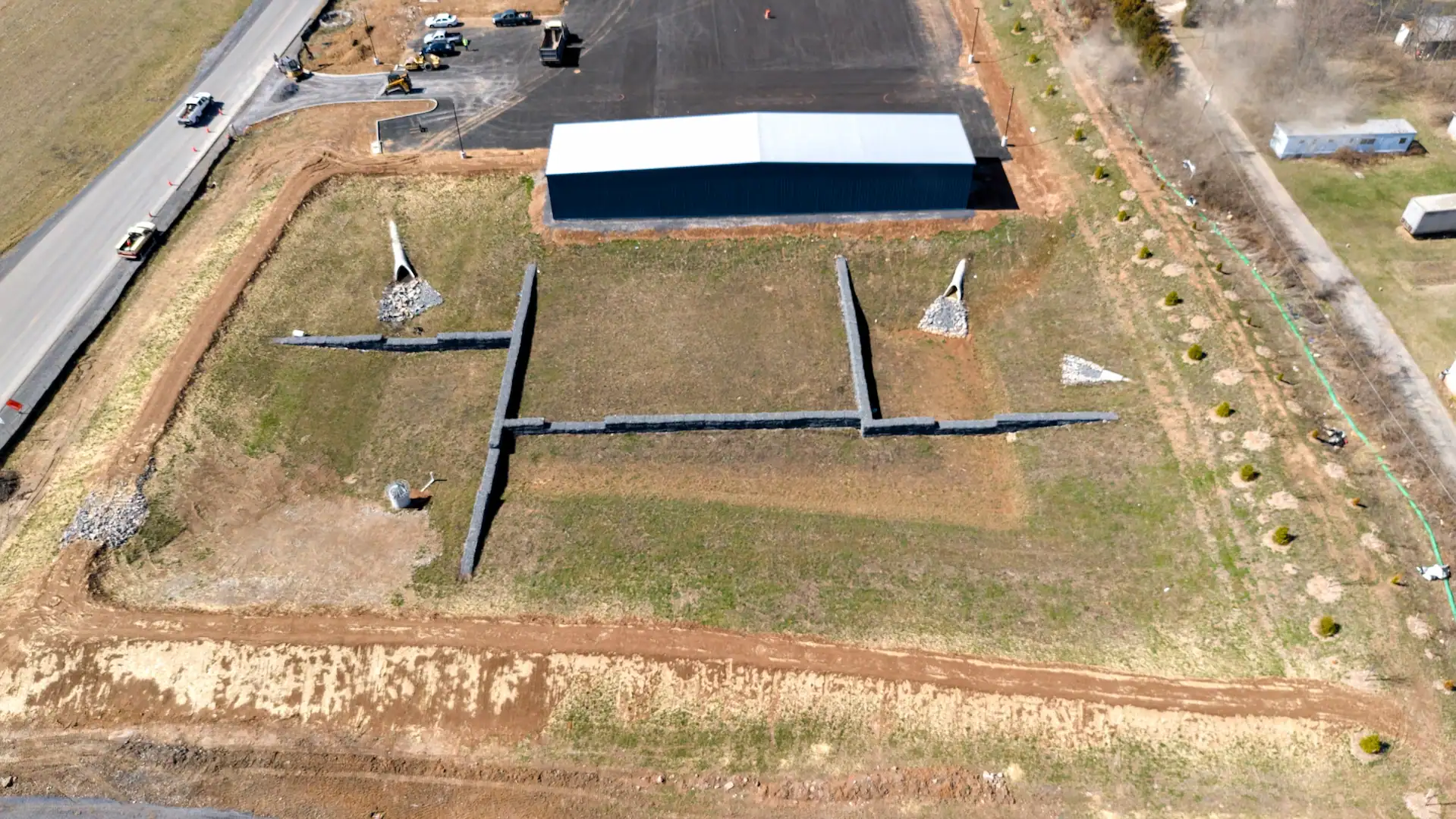 Aerial photo of pine knoll construction completed private pond and sediment pond for local company in Winchester VA.