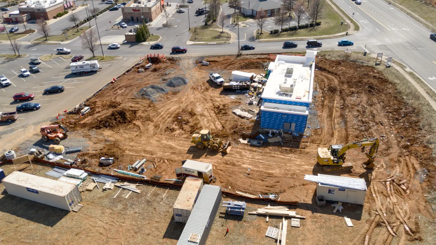 Aerial photo of excavation, grading, site work, and utility work beginning for the taco bell project on RT 50 West.