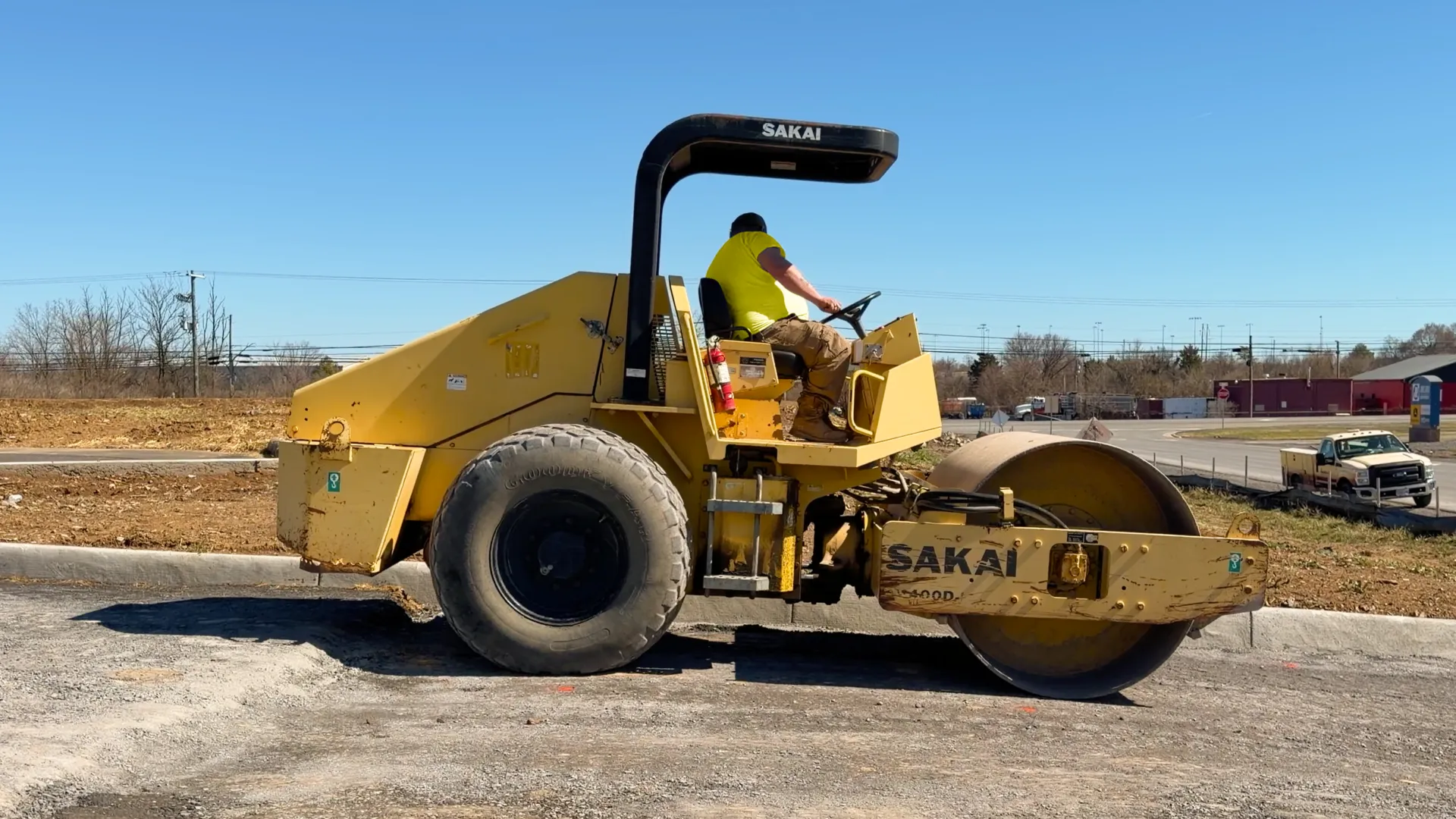 Roller equipment compacting subgrade for a road construction and paving project in Winchester VA.